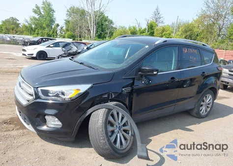 2017 Ford Escape Titanium z USA, uszkodzony, nr VIN 1FMCU0JD6HUE23085
